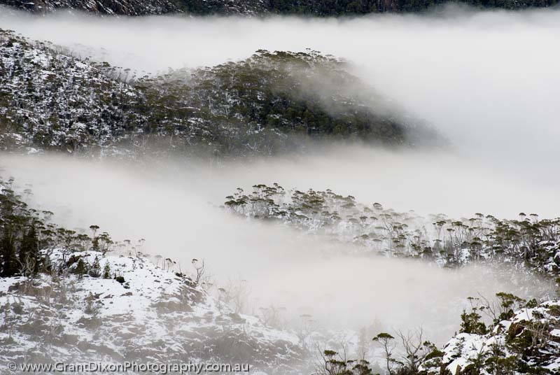 image of Snowy ridges in mist