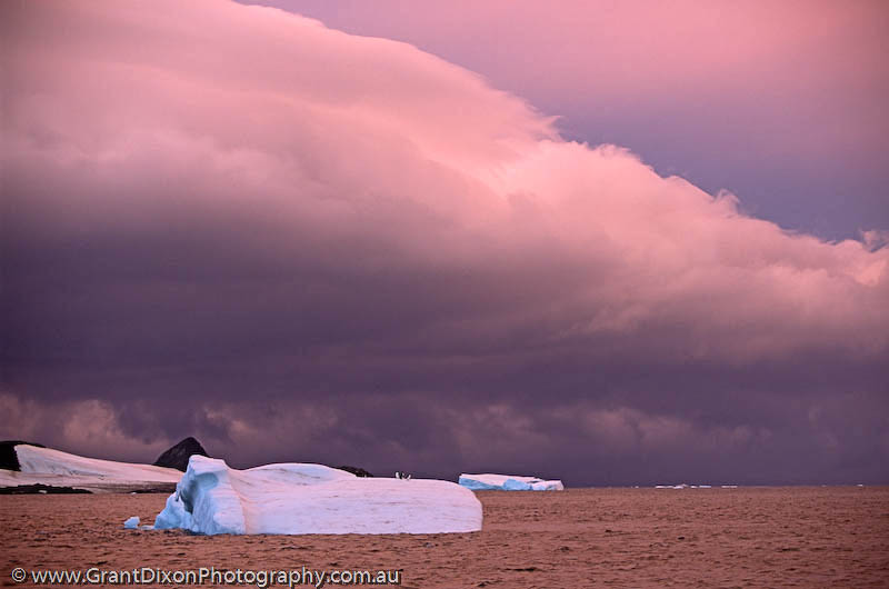 image of Iceberg and storm clouds 1