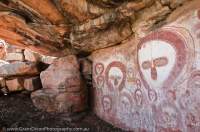 AUSTRALIA, Western Australia, West Kimberley. Bachsten Creek.  Wandjina (creator beings), rock art style painted during last 4000 years.