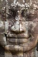 CAMBODIA, Siem Reap, Temples of Angkor. Detail of face towers at Bayon, state temple of Jayavarman VII constructed in 13th century at Angkor Thom. There are 216 faces on 49 towers (37 remain standing).