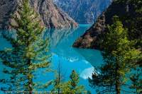 NEPAL, Dolpo. Phoksundo Lake, turquoise glacial outwash water of Nepal's highest (3600m) large lake.
