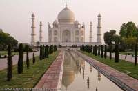 INDIA, Uttar Pradesh, Agra. Taj Mahal, built by Mughul emperor Shah Jahan in 1630 as mauseleum for his queen Mumtaz Mahal, lies within formally laid out gardens. A World Heritage site and considered one of the new 7 wonders of the world.