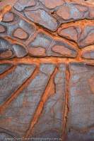 Weathered fractures in Banded Iron Formation (BIF) pavement, Snell Gorge, Hamersley Range, Karijini National Park, Western Australia.
