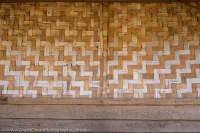 Woven bamboo wall on village house, Xieng Khuang, Laos.