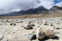 Sand and moraine boulders at Pangong Tso, a giant high-altitude (4200m) lake.