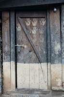 Handprints on door, Philim area, Budhi Gandaki valley, Manaslu Circuit, Gorkha, Nepal