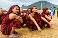 Monks watching festivities at 2014 fire (hot air) balloon festival in Taunggyi, part of full-moon celebrations during Tazaungmon (Tazaungdaing).