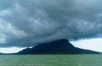 Storm cloud over Santubong Peninsula, Kuching Wetlands, Sarawak, Malaysia.