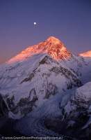 NEPAL, Himalaya, Mt Everest. Alpenglow on summit of Mt Everest, southwest face rising above Khumbu Glacier.
