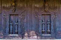 Wall and door detail at Shwe In Bin Kyaung, carved teak monastery commissioned by wealthy Chinese jade merchants in 1895.