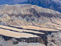 NEPAL. Eroded alluvial fans and hill slopes (badlands) above Kali Gandaki River valley, Mustang.