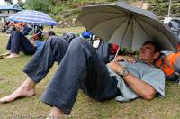 NEPAL. Trekkers resting after strenuous day, Arun valley, Makalu Base Camp Trek.