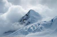 NEPAL. Rising cloud engulfs glacier below Baruntse (7220m),  Makalu - Barun National Park.