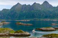NORWAY, Nordland. Lofoten Islands, Austvagoy. Oddvaer islets, Storemolla island beyond.