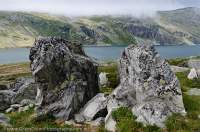 NORWAY, Oppland, Rondane National Park. Glacial moraine boulders above Rondvatnet lake.