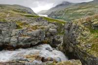 NORWAY, Oppland, Rondane National Park. Waterfall in small gorge near Rondvatnet lake.