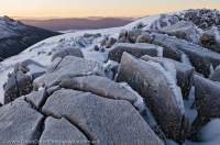 Frosty fissured dolerite at dawn, winter. Mt Field National Park, Tasmanian Wilderness World Heritage Area.
