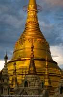 Naugdawgyi Paya (Elder Brother Pagoda) at Shwedagon Paya, one of Buddhism's most sacred sites; sunset.
